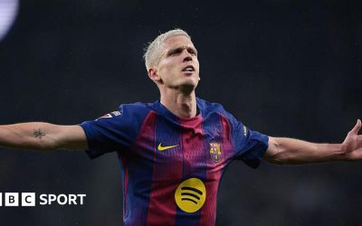 Dani Olmo celebrates scoring for Barcelona