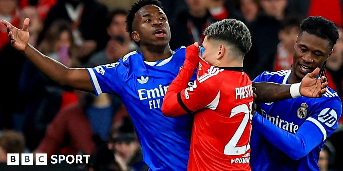 Real Madrid's Vinicius Junior reacts after an interaction with Benfica's Gianluca Prestianni