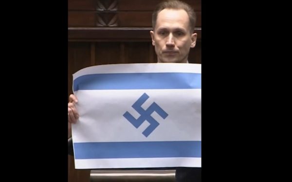 Deputat extremist, șoc în Polonia: steag israelian cu svastică în Parlament